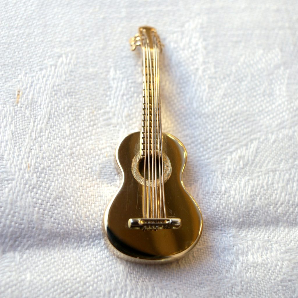 Mini guitare en or jaune et or gris